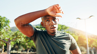 Buy stock photo Fitness, tired and black man with breathing in nature for workout performance, running challenge and recovery. Athlete, sweating and exhausted at park for marathon exercise, resting and cardio break
