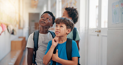 Buy stock photo Children, friends and hallway at school for education, learning and idea at recess. Boys, classmates and students together for development, knowledge and thinking in elementary with creative art