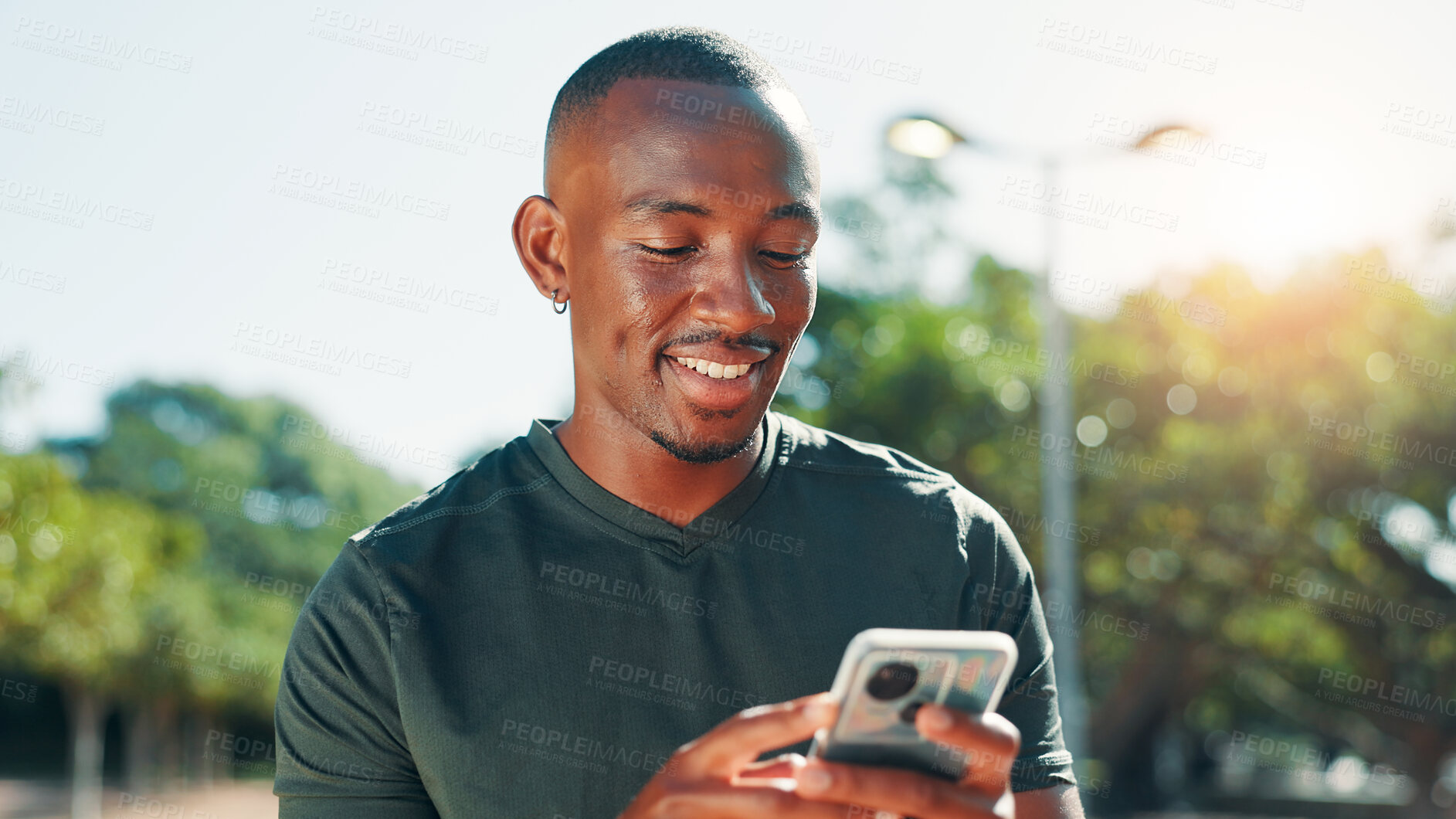 Buy stock photo Outdoor, black man and fitness with smartphone for chat, social media and online for workout tutorial. Nature, male person and mobile with exercise app for wellness tips, text and tracking progress