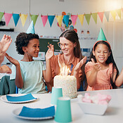 Birthday, cake and students with teacher in classroom for group party ...