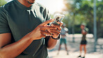 Man, hands and typing with phone for fitness, sport app or browsing social media at outdoor park. Closeup, male person or texting with smartphone for tracking performance or marathon progress goals
