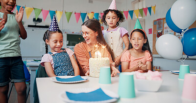 Buy stock photo Children, teacher and birthday cake for celebration in classroom with singing, party or social event. Friends, happy people and shy student at learning academy with applause or support on special day