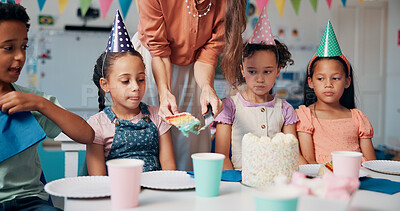 Buy stock photo Teacher, party and kids with birthday cake in classroom, giving and celebration with snacks at school. Person, children and sharing for dessert, cheers and plate with students for event at academy