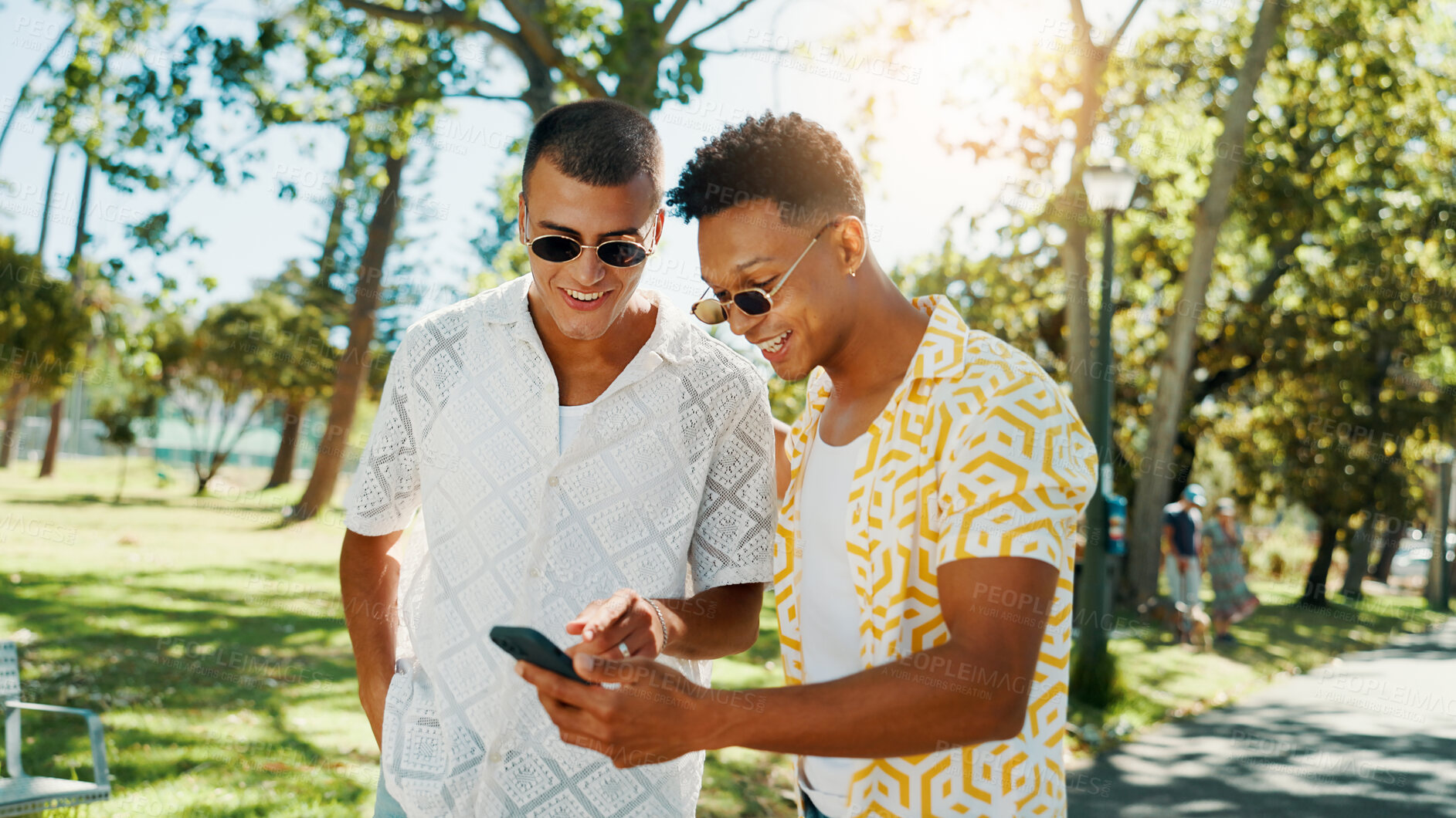 Buy stock photo Happy, friends and men with phone at park for social media post, online blog and reading text message. Mobile, gen z people and outdoor together for internet, communication and show video on app