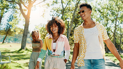 Buy stock photo Happy, walking and couple in park on weekend to relax for bonding, date and relationship outdoors. Fashion, summer and man with woman in nature for adventure on holiday, vacation and break for fun