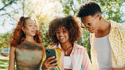 Buy stock photo Friends, happy and show phone at park for social media gossip, online drama and internet news. Gen z people, relax and smartphone with surprise information, web announcement and text notification