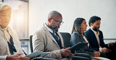 Buy stock photo Seminar, reading and man with documents, group and colleagues in workshop for training or meeting. Conference, information and coworkers with notes for presentation, audience and people in boardroom