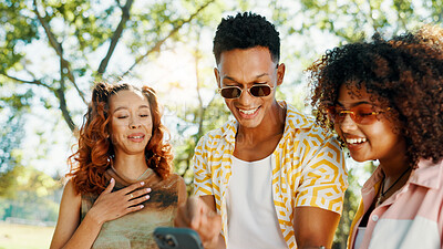 Buy stock photo Friends, laughing and reading phone at park for social media meme, online gossip and funny internet news. Gen z people, happy and smartphone for dating app chat, text notification and show message