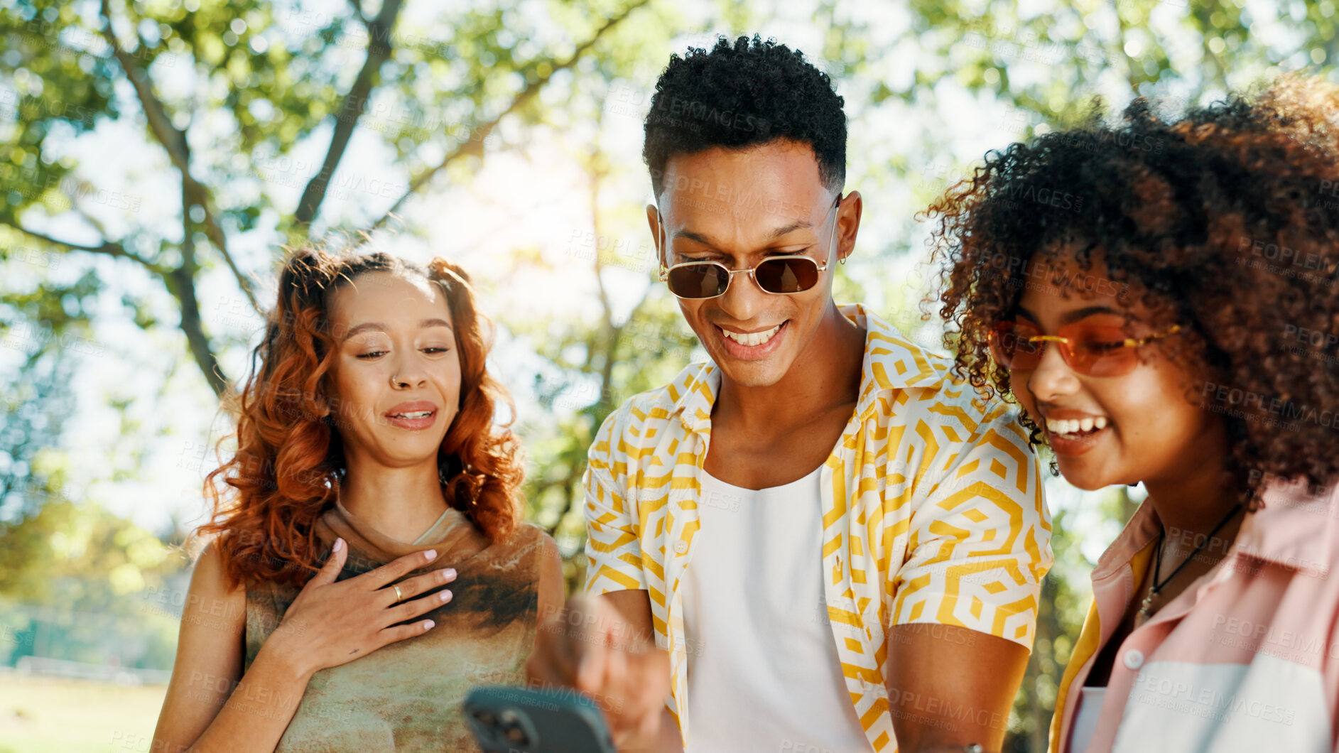 Buy stock photo Friends, laughing and reading phone at park for social media meme, online gossip and funny internet news. Gen z people, happy and smartphone for dating app chat, text notification and show message