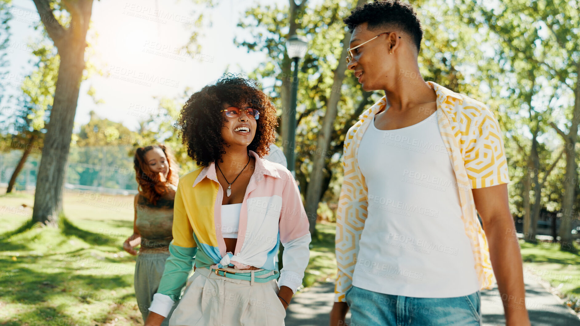 Buy stock photo Happy, walking and couple in park to relax for bonding, date and relationship outdoors on weekend. Fashion, summer and man with woman in nature for adventure on holiday, vacation and break for fun