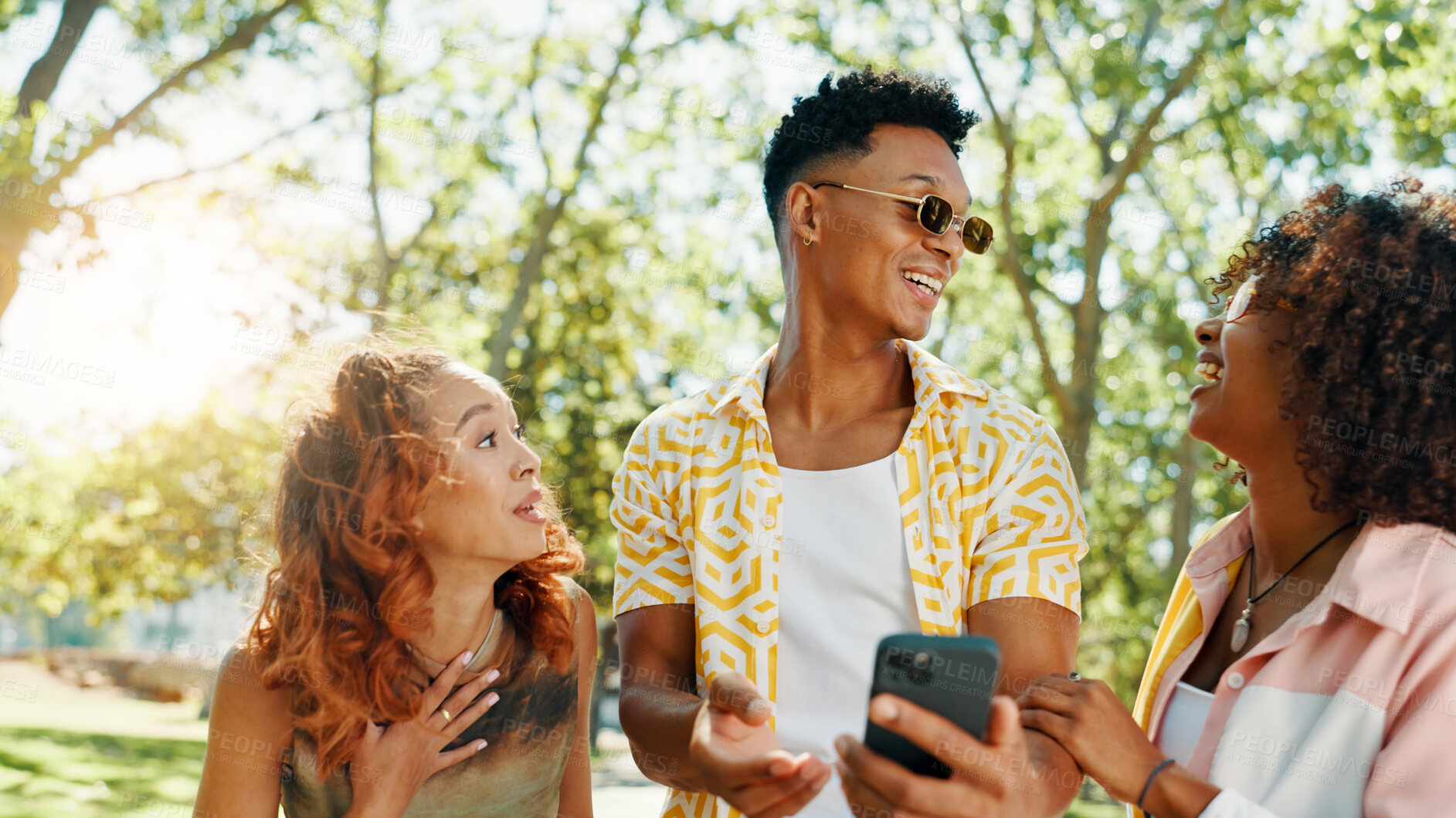 Buy stock photo Friends, surprise and laughing with phone at park for social media gossip, online drama and funny news. Gen z people, happy and smartphone with internet information, web announcement or dating app