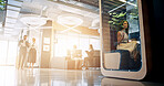 Lobby, meeting and business people in office in morning with cubicle for collaboration, teamwork and discussion. Professional, corporate and men and women walking in workspace pods for productivity