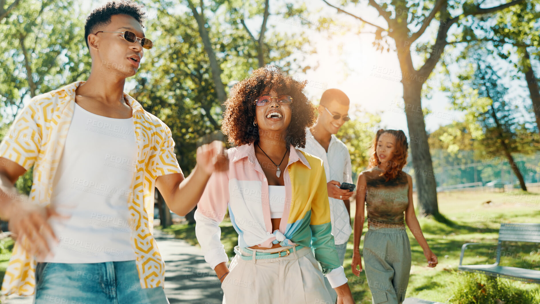 Buy stock photo Smile, people and talk at park outdoor for social gathering, university break and bonding together. Group of friends, walk and streetwear clothes with summer holiday, travel journey and reunion trip