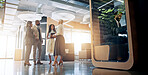 Lobby, meeting and business people in office for coworking space for collaboration, teamwork and discussion. Professional, corporate and men and women talking with cubicle for private workspace