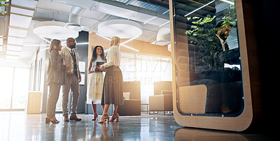 Buy stock photo Lobby, pod and business people in office for coworking space for collaboration, teamwork or discussion. Professional, corporate and men and women talking with cubicle for meeting in private workspace