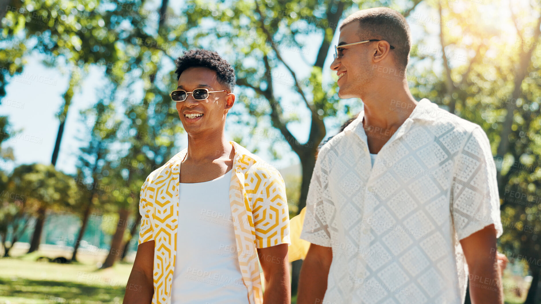 Buy stock photo Smile, men and friends talk at park for social gathering, university break and bonding together. Happy, people and walking with streetwear clothes for summer holiday, travel journey and reunion trip