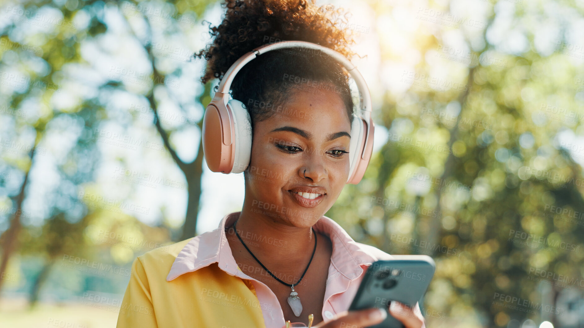 Buy stock photo Park, woman and smile with smartphone for headphones, audio track and check location on vacation outdoor. Nature, African female person and tourist with mobile for travel application, music and happy