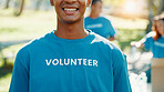 Volunteer, smile and helping with man in park for recycle program, earth day or social responsibility. Environment, climate change and ngo with person in nature for non profit, cleaning or charity