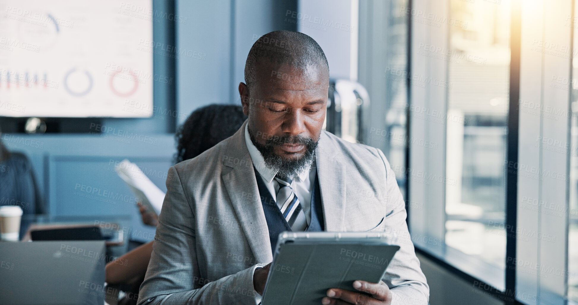 Buy stock photo Meeting, online and mature man with tablet, review and checking stock market on web, serious or digital. Office, people and account manager with tech for industry trends, reading and stats of company