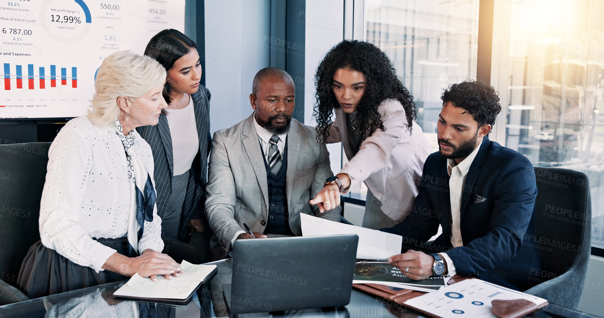 Buy stock photo Business people, laptop and meeting with graphs for company performance, report or review at office. Group, paperwork or analytics with discussion, chart or project statistics for finance workplace