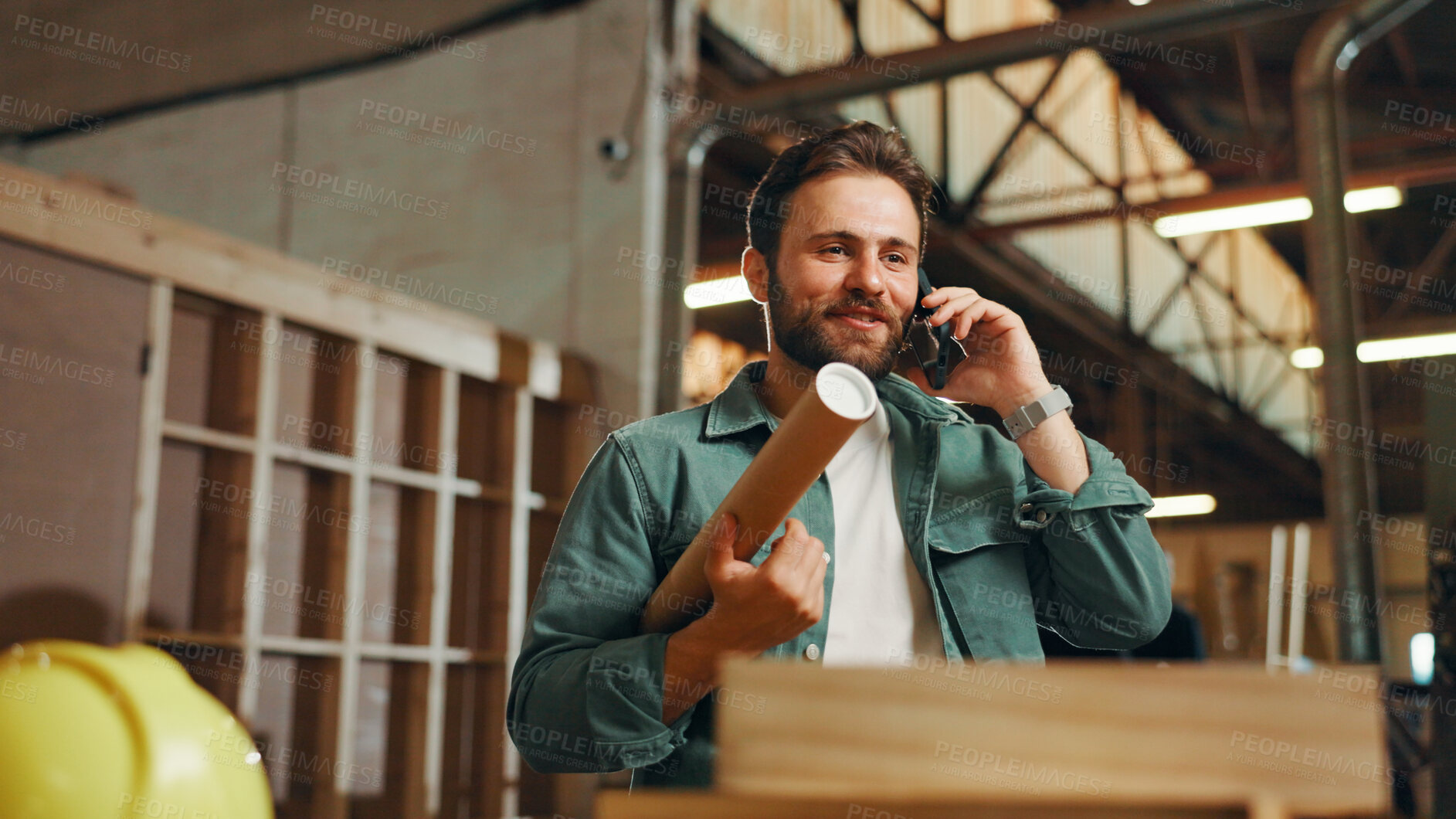 Buy stock photo Business, phone call and man in workshop, online order and blueprints with deadline for woodwork project. Person, employee and contractor in factory, smartphone and approval for building renovation