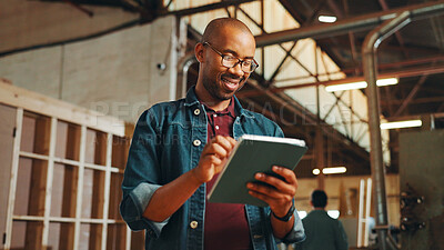 Buy stock photo Carpentry, happy or man with tablet in workshop for inventory management, woodwork order or quality control. Timber manufacturing, black person and digital app for furniture production or client chat