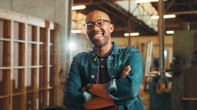 Buy stock photo Portrait, carpenter and man with arms crossed, workshop and happy for career growth in business. Manufacturing, entrepreneur and black person with smile for startup, confident and wooden furniture