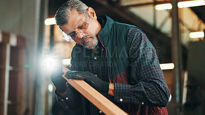 Buy stock photo Carpenter, mature and wood for construction, furniture or renovation project planning. Woodworker, DIY person and plank with tools in creative carpentry workshop for manufacturing, art and craft