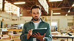 Carpenter, woodwork and man with tablet in factory for stock management, online order and inventory checklist. Timber workshop, supervisor and digital app for furniture production and manufacturing