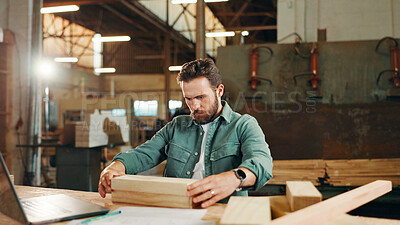 Buy stock photo Carpenter, wood and laptop with blueprint for construction, furniture or project planning. Woodworker, person and plank with tools in creative carpentry workshop for manufacturing, art and craft