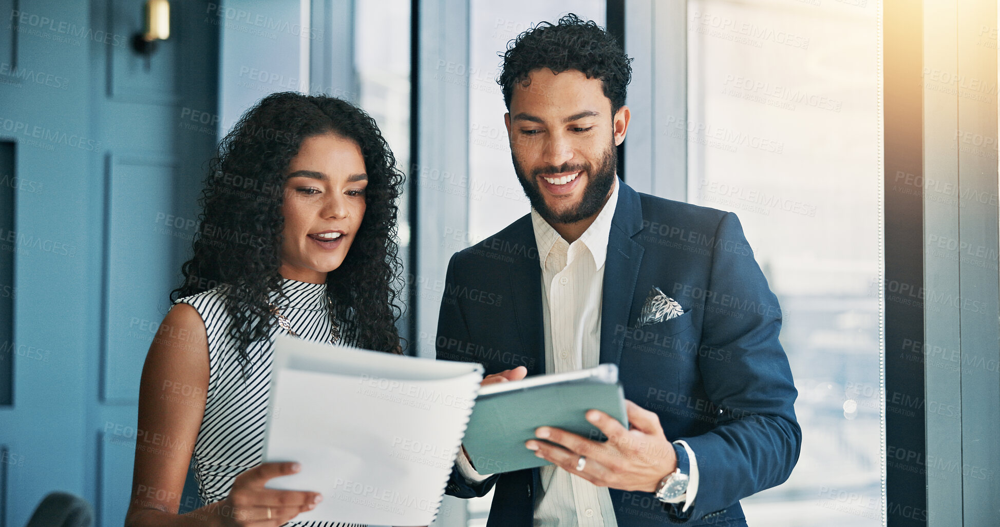 Buy stock photo Women, man and documents with tablet in office, finance or feedback for report in hallway. Business people, talk and happy for results, paperwork or review with stock performance at investment agency