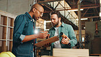 Carpentry, talking and men in workshop with clipboard for woodwork, furniture restoration and lumber manufacturing. Construction, planning and people with planks, timber and board for renovation