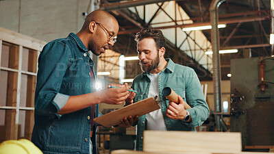 Buy stock photo Carpentry, talking and men in workshop with clipboard for woodwork, furniture restoration and lumber manufacturing. Construction, planning and people with planks, timber and board for renovation