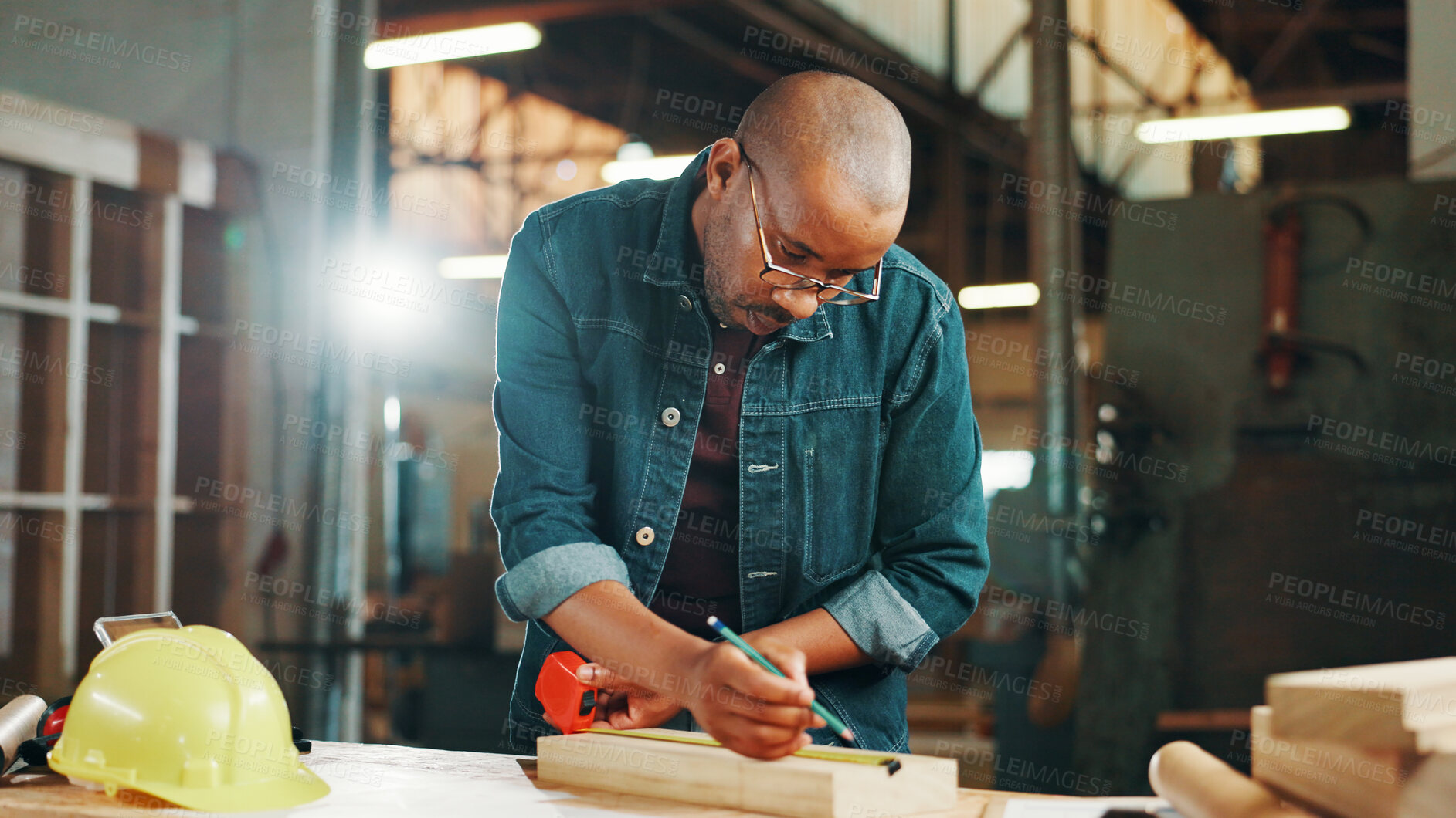 Buy stock photo Measuring tape, wood and writing with carpenter black man in workshop for manufacturing or production. Carpentry, construction and planning with professional contractor at work for renovation