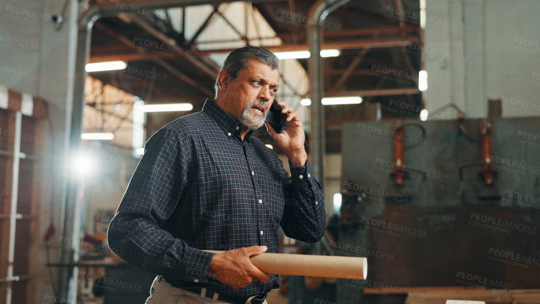 Buy stock photo Business, phone call and man in workshop, angry and stress with deadline for woodwork project. Mature person, employee and contractor in factory, cellphone or mistake with cancelled order or pressure