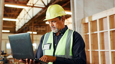 Buy stock photo Carpentry, research and man on laptop in workshop for woodworking, furniture restoration and lumber business. Construction, factory and person on computer for planning, timber renovation or inventory