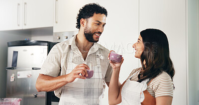 Buy stock photo Drink, smoothie and smile with couple in kitchen for detox glass, breakfast and gut health. Organic, nutrition and happiness with man and woman at home for juice, protein shake and vitamins