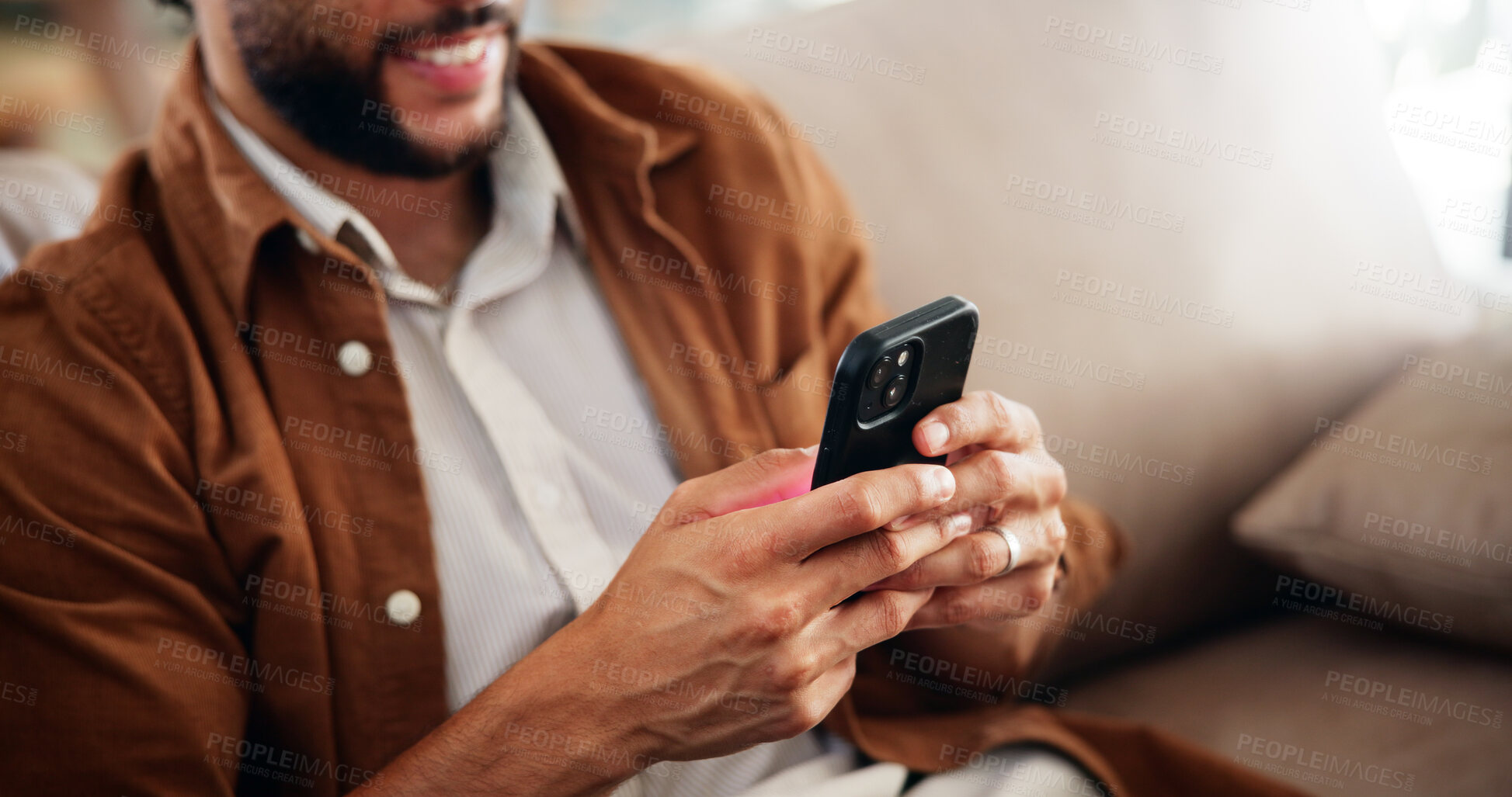Buy stock photo Home, hands and man on sofa, smartphone and texting with social media, internet and connection. Closeup, apartment and person on couch, cellphone and communication with digital app, email and message