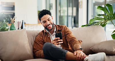 Buy stock photo Man, relax and laugh on sofa with mobile, social media and meme website for joke in home. Person, network or phone in living room for streaming subscription, funny message and happy with comedy blog