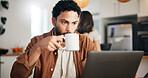 Coffee, laptop and remote work with man in kitchen for research, blog writer and news update. Entrepreneur, freelancer and online feedback with person at home for media update, startup and planning