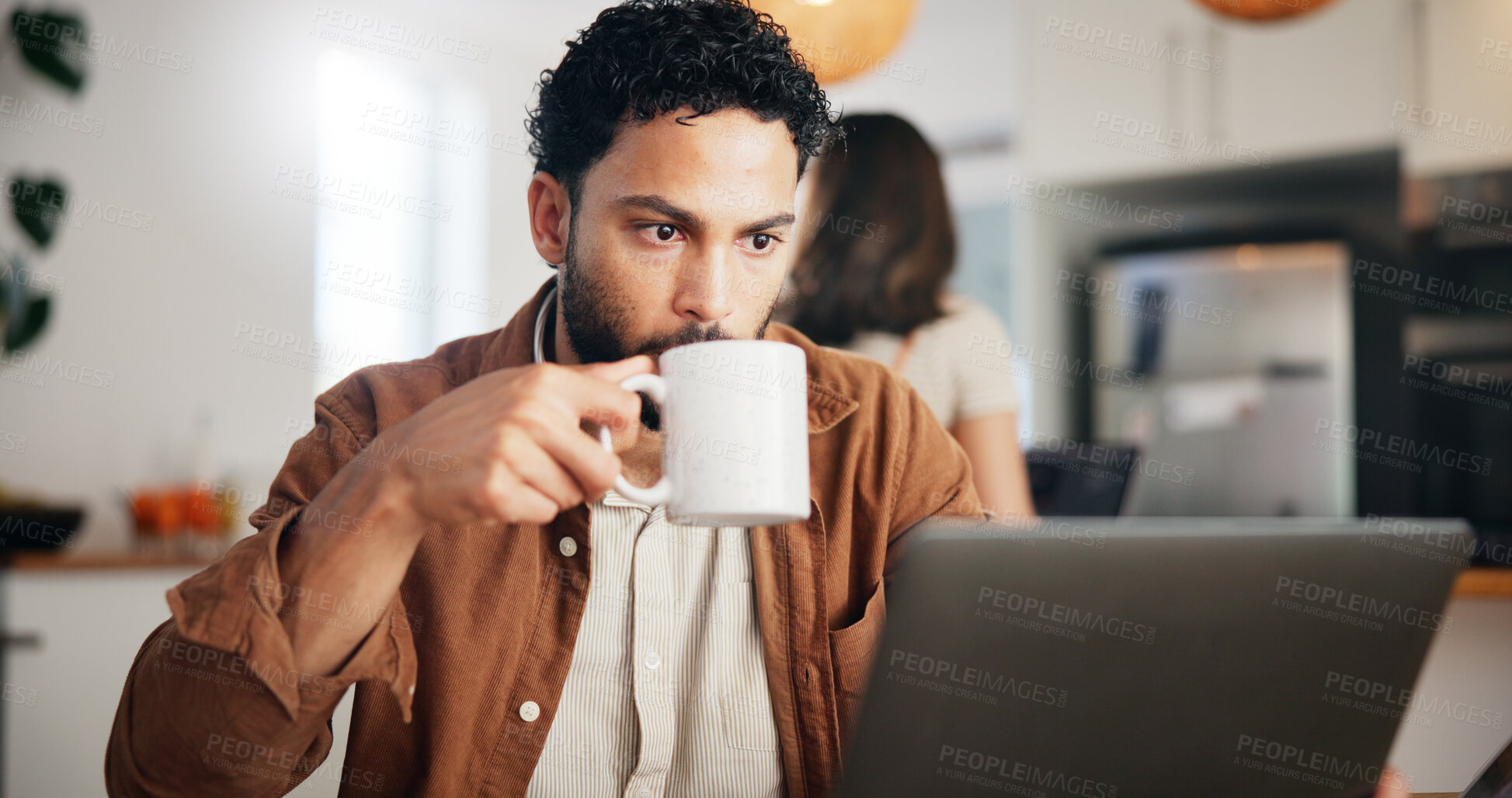Buy stock photo Coffee, laptop and remote work with man in kitchen for research, blog writer and news post. Entrepreneur, freelancer and online feedback with person at home for media update, startup and planning