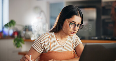 Buy stock photo Research, reading or woman on laptop in house for remote work, learning with online report. Schedule, female author or creative freelancer with notebook for blog, planning ideas or publishing review