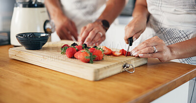 Buy stock photo Strawberry, smoothie and hands of couple in kitchen for detox drink, breakfast and gut health. Fruit, nutrition and blender with closeup of people at home for juice, protein shake and vitamins
