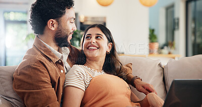 Buy stock photo Couple, laptop and happy on sofa in home for romantic date, movie streaming and bonding together. Love, people and relax with technology for online show, connection or web subscription in living room