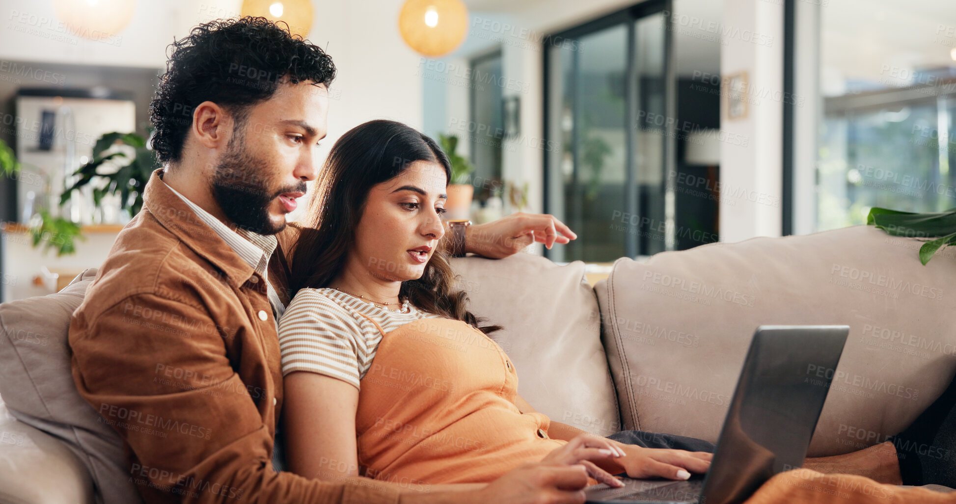 Buy stock photo Home, internet and couple on sofa, laptop and conversation with movie, bonding together and connection. People, apartment and man with woman, computer and romance with entertainment and online film