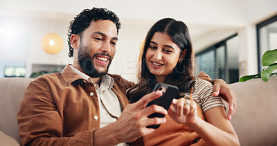 Buy stock photo Home, relax and couple in lounge, smartphone and email with social media, internet and relationship. Digital app, man and woman on couch, cellphone and marriage with message, texting and conversation