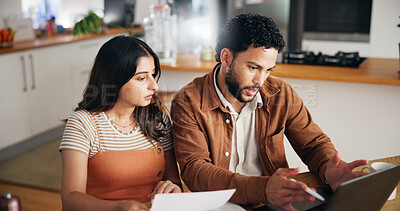 Buy stock photo Savings, laptop or couple in home for planning, asset management or online banking. Document, man and woman in kitchen with bills, tax expenses or financial discussion with payment for insurance loan