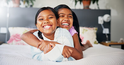 Buy stock photo Portrait, hug and girls in bedroom, smile and bonding together with break, funny and support. Home, siblings and sisters with happiness, relax and comfort with embrace, children and trust with care