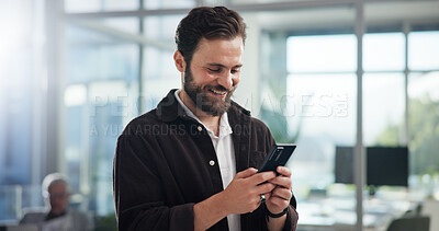 Buy stock photo Smile, creative and business man with phone in office for networking, typing text or social media marketer online. Mobile, startup and worker reading email, campaign and brand promotion on platform