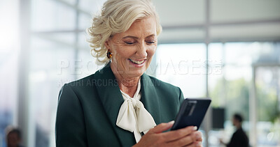 Buy stock photo Smile, mature and business woman with mobile in office for networking, investment or reading financial news. Phone, corporate ceo and check email for profit growth, private equity or venture capital